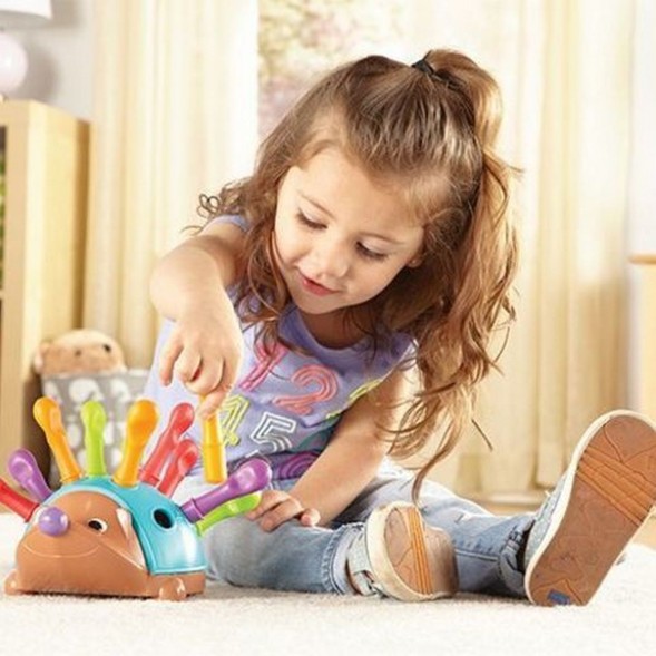 Развивающая игрушка “Ёжик Спайк”